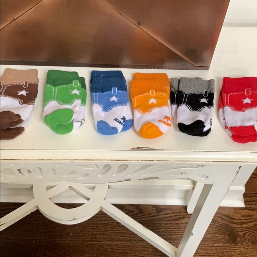 6 pairs of socks. Like new. In box.